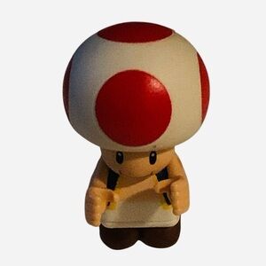 K'NEX Super Mario Bros. Toad 2-inch minifigure.